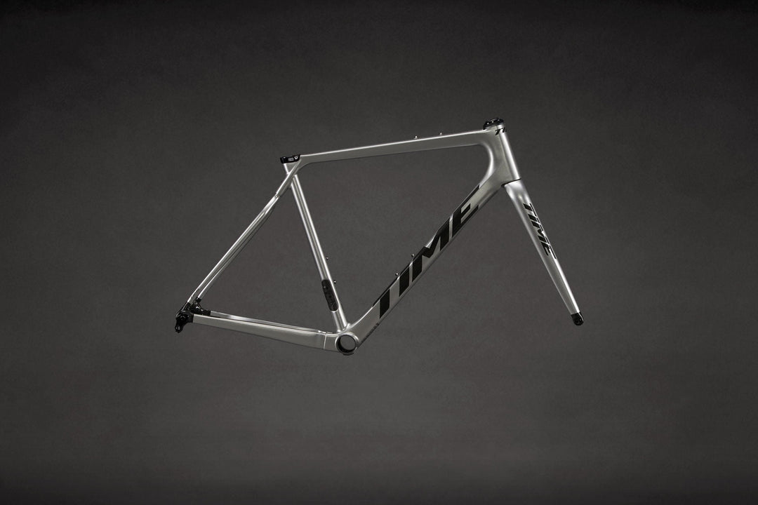 TIME ADHX 45 gravel frameset 2025 season in V43 Brilliant Silver colorway, full profile studio shot

